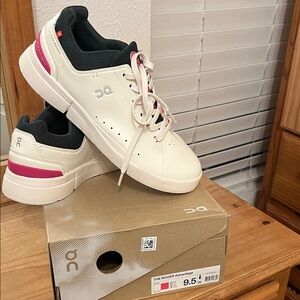 On Running Cream and Pink Sneakers